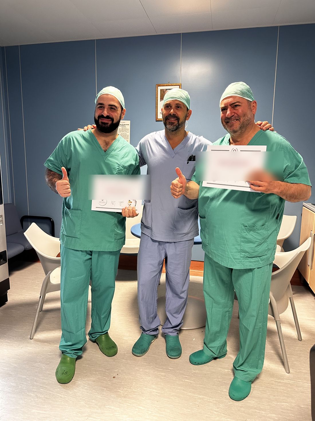 Certificates of attendance being presented to two visiting orthopaedic surgeons at Casa di Cura Figlie di San Camillo in Cremona